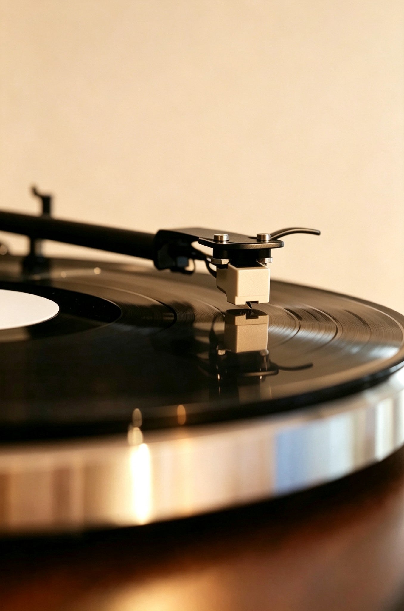 AUDURA turntable stylus playing vinyl record close up