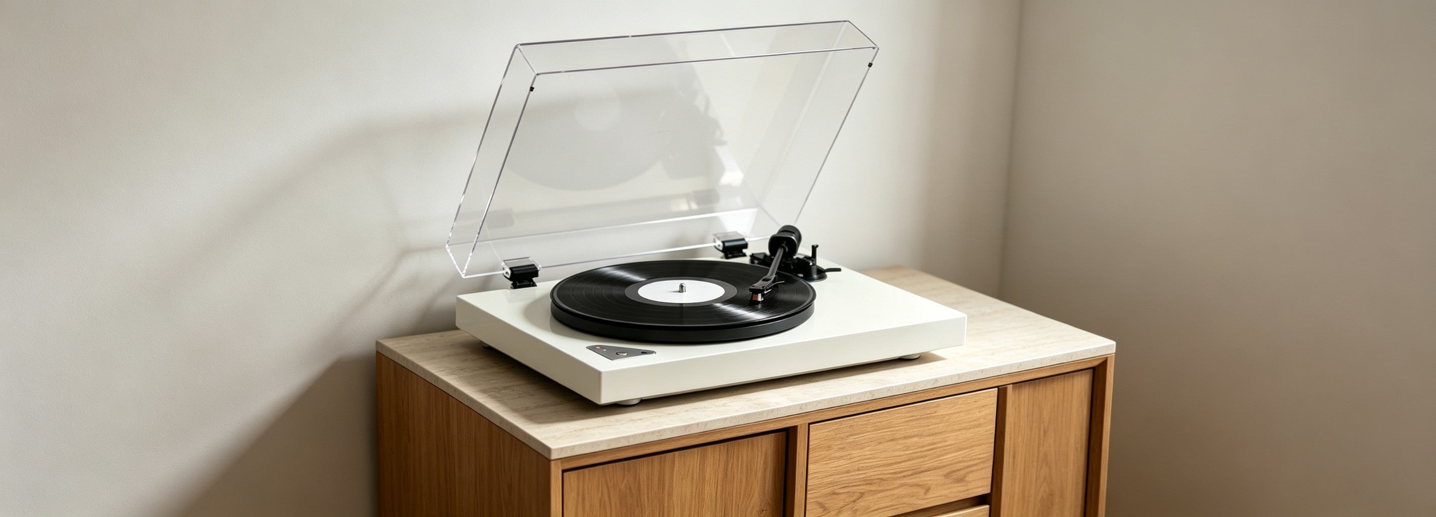 High-end home setting featuring the AUDURA Pure turntable playing a vinyl record