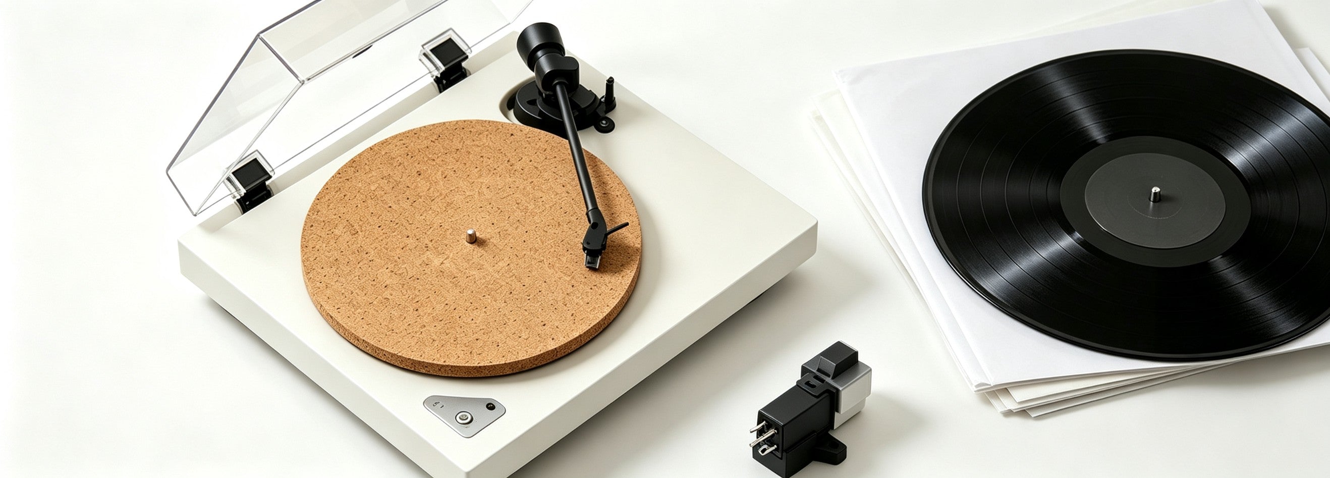AUDURA Pure turntable with vinyl record and premium accessories showcasing detailed analog listening experience