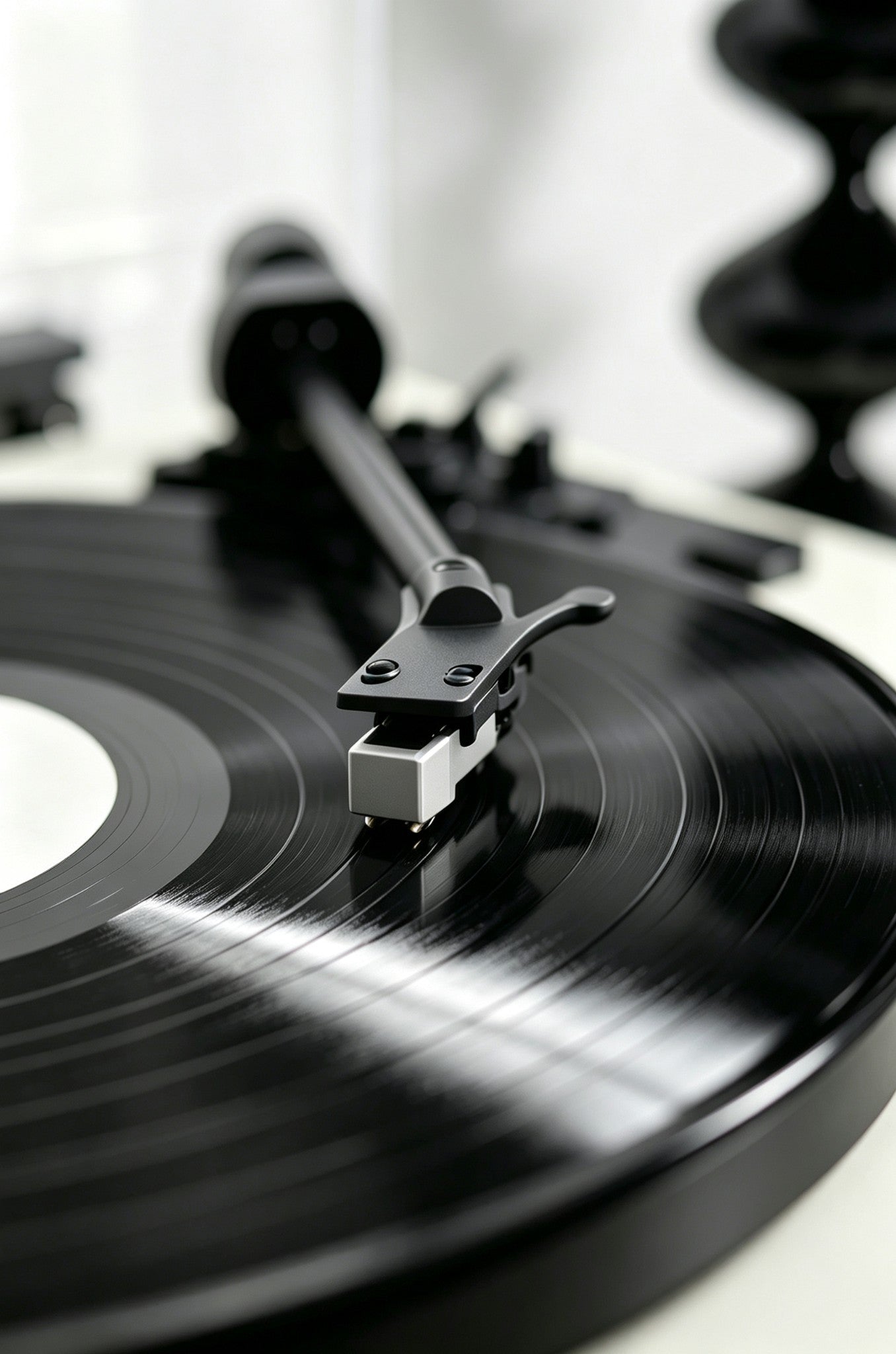 AUDURA turntable stylus playing vinyl record close up